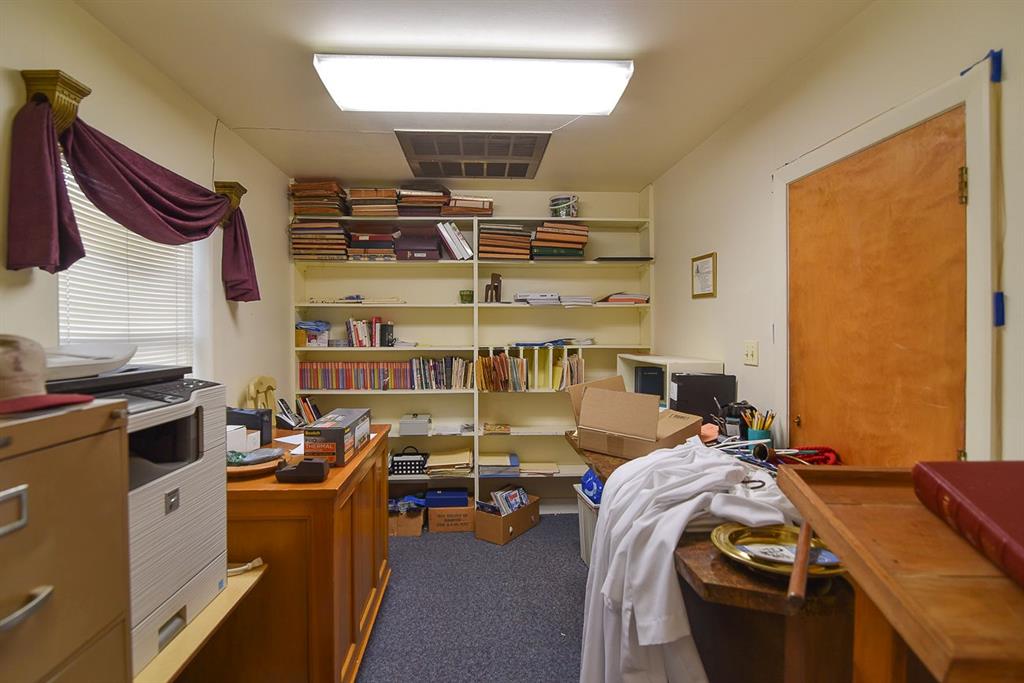 4403 Phillips Drive Wichita Falls, TX 76308 - Photo 11 of 40 a bed room with a bed and a desk