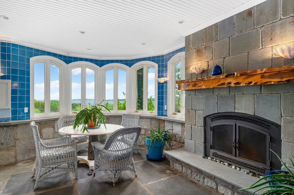 965-973 Hale Street Beverly, MA 01915 - Photo 13 of 42 a living room with furniture and a fireplace