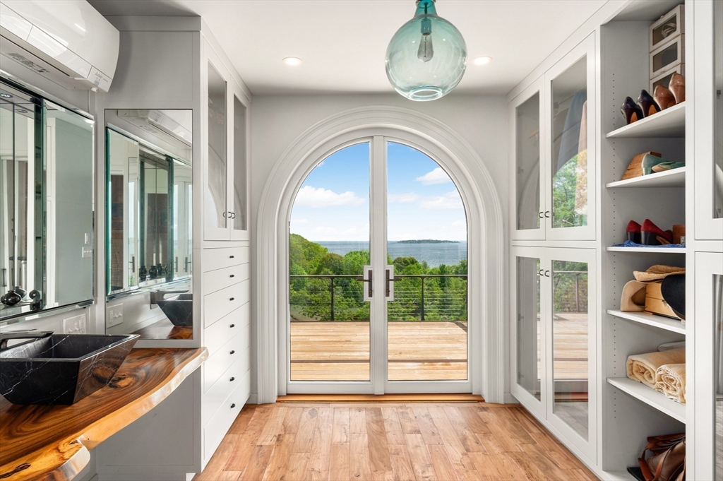 965-973 Hale Street Beverly, MA 01915 - Photo 20 of 42 a large kitchen with stainless steel appliances wooden floor and a large window