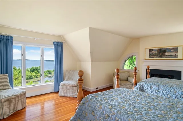 a bedroom with a bed and a couch