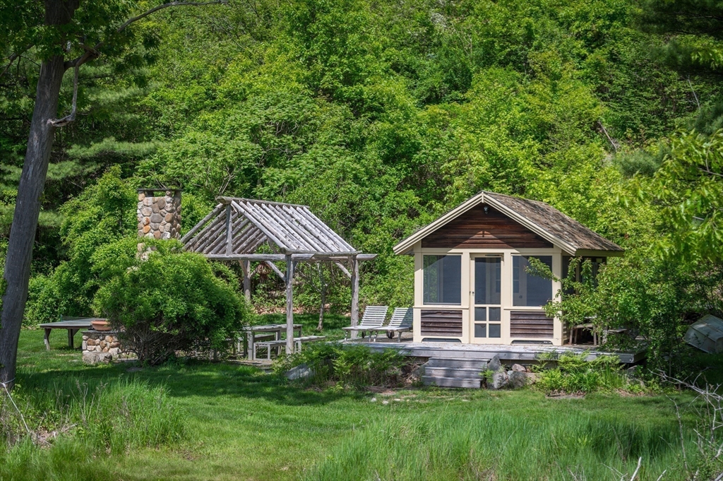 965-973 Hale Street Beverly, MA 01915 - Photo 30 of 42 a front view of a house with a garden
