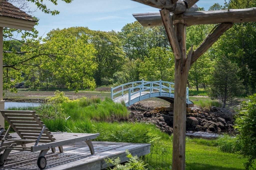 965-973 Hale Street Beverly, MA 01915 - Photo 32 of 42 a view of a yard with plants and a table and chairs