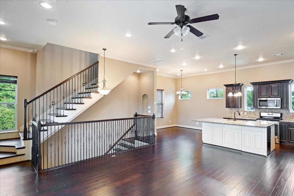 1516 Amundsen Street Houston, TX 77009 - Photo 5 of 32 a view of kitchen with sink and wooden floor