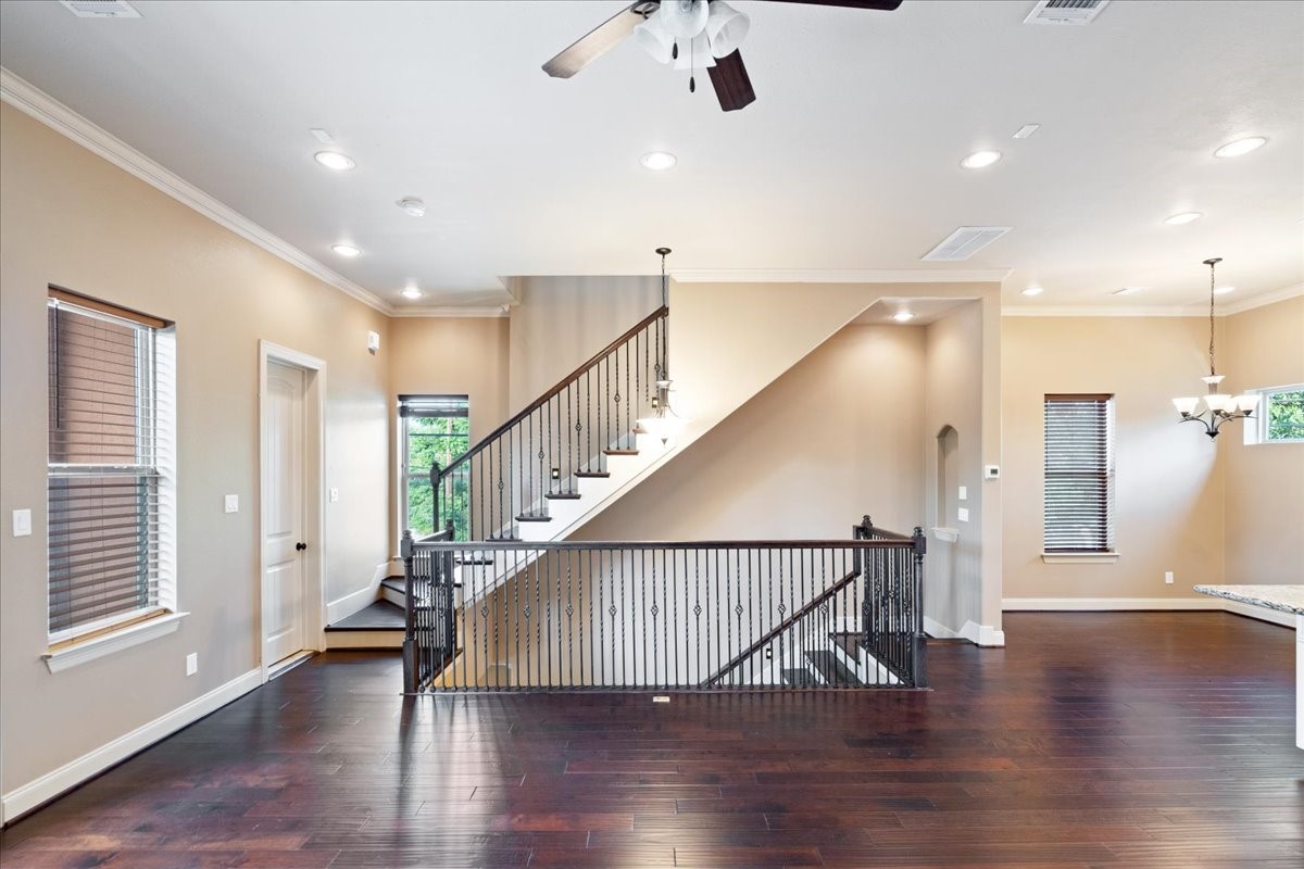 1516 Amundsen Street Houston, TX 77009 - Photo 7 of 32 a view of entryway and hall with wooden floor