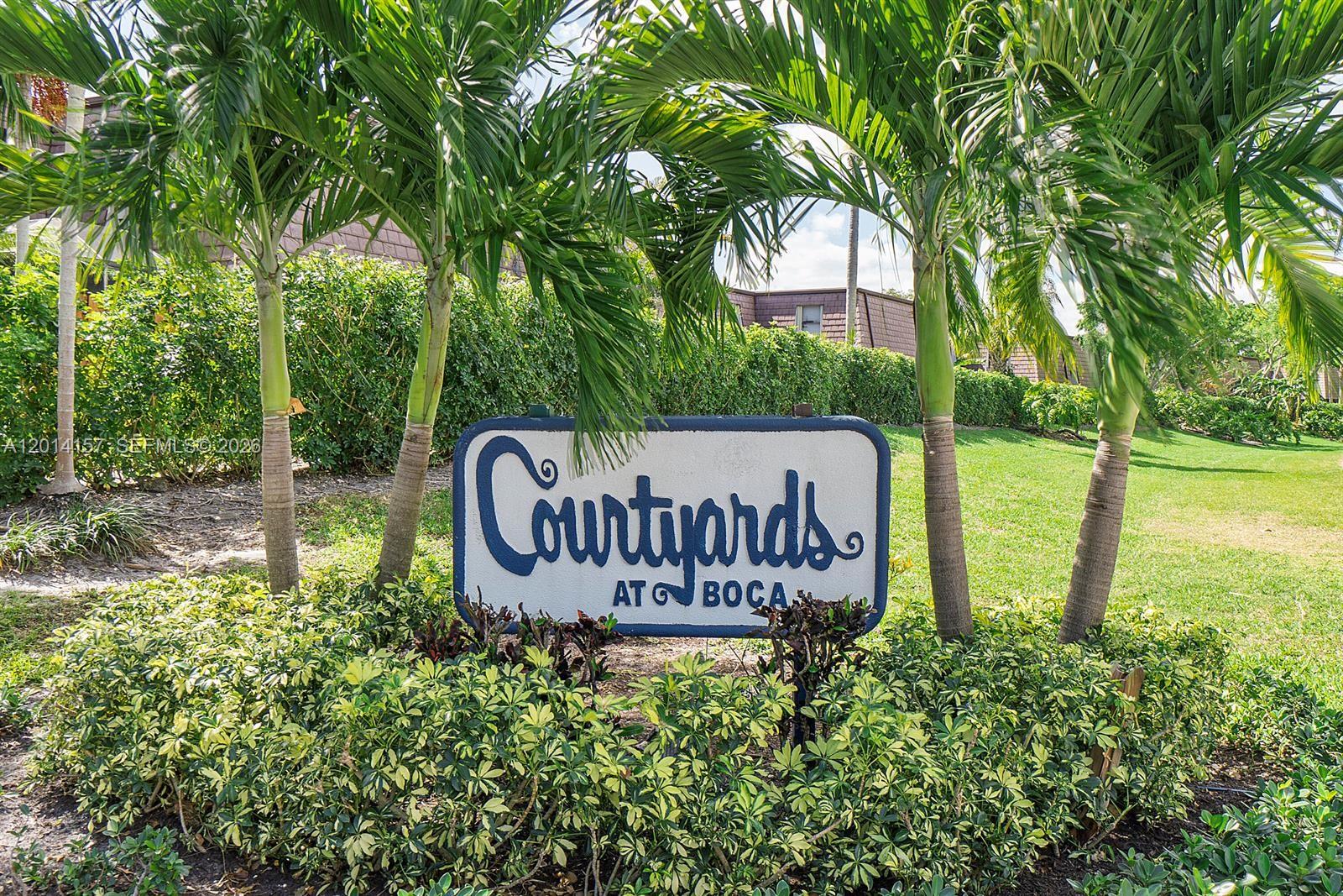 7744 Courtyard Run West Boca Raton, FL 33433 - Photo 25 of 25 a view of garden with swimming pool