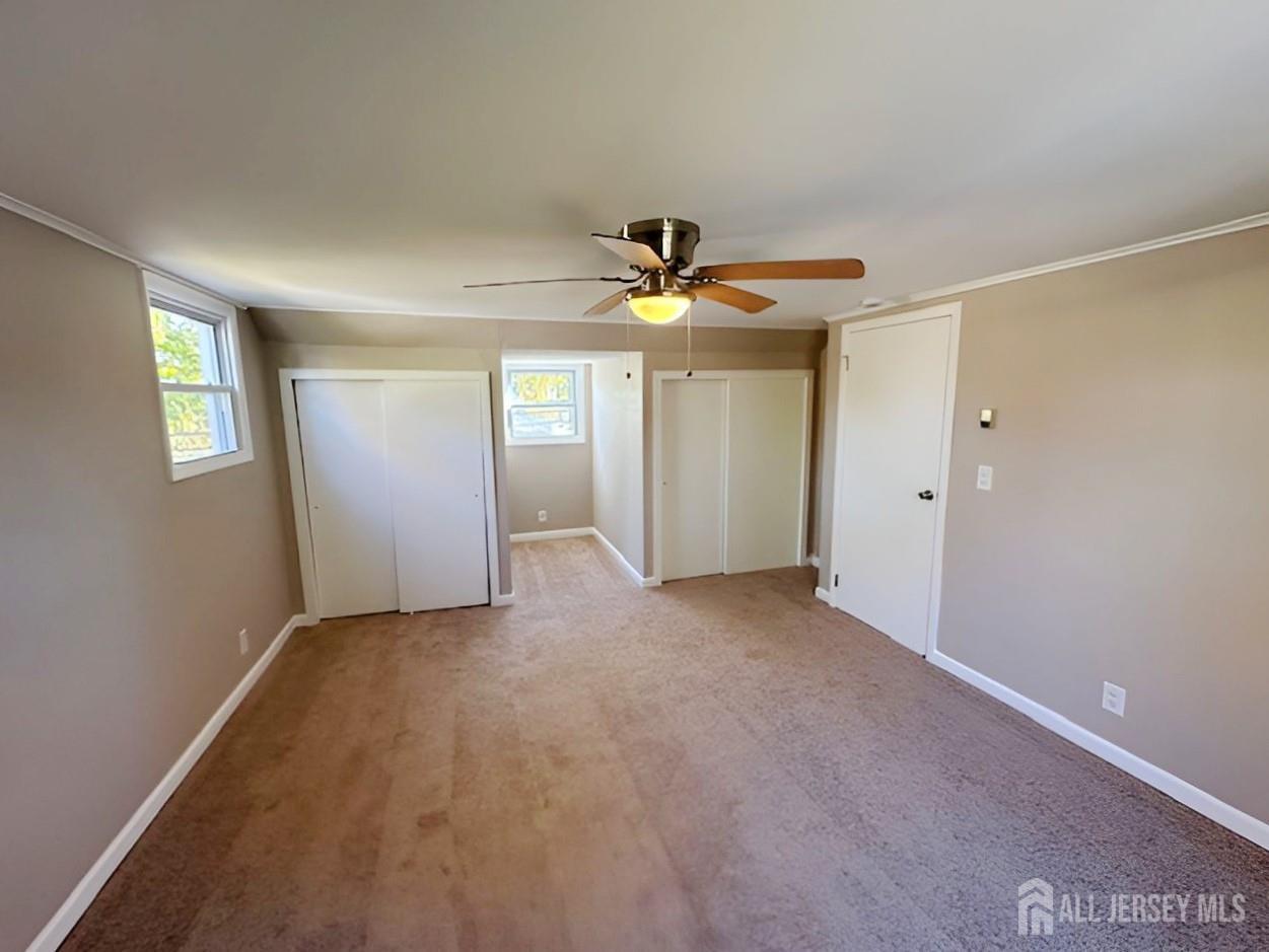 125 Raritan Boulevard Old Bridge, NJ 07735 - Photo 13 of 29 a view of an empty room with a window