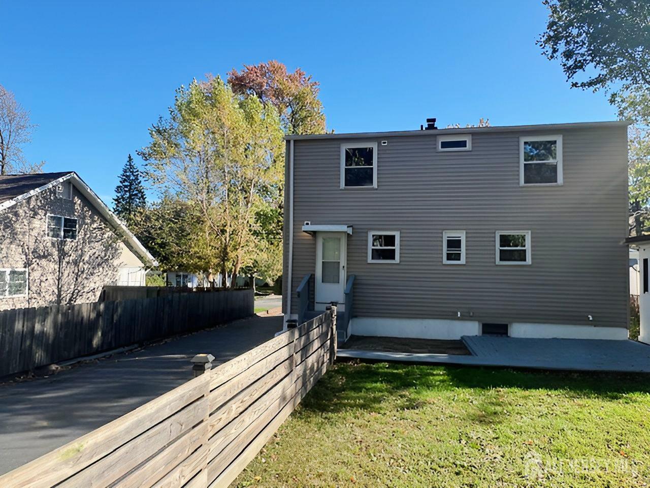 125 Raritan Boulevard Old Bridge, NJ 07735 - Photo 29 of 29 a view of a house with backyard and sitting area