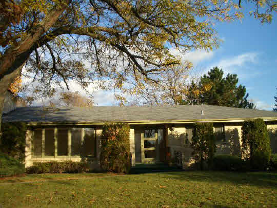 4203 Singleton Road Rockford, IL 61114 - Photo 1 of 6 front view of house with a yard