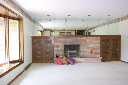 4203 Singleton Road Rockford, IL 61114 - Photo 3 of 6 a living room with furniture and a fireplace