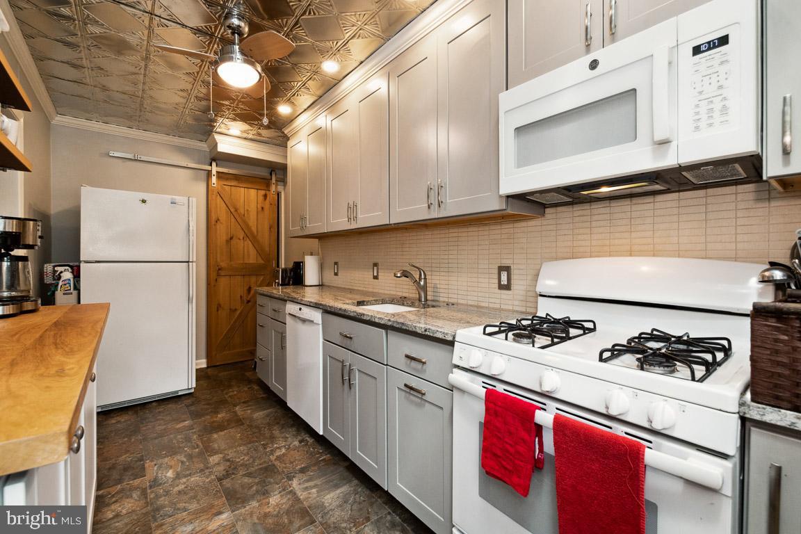 8336 Wyton Road Towson, MD 21286 - Photo 15 of 40 Sliding barn door to lower level