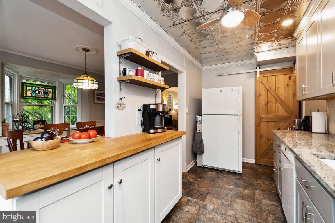 8336 Wyton Road Towson, MD 21286 - Photo 16 of 40 "Prep bar" with cabinetry, large pass through