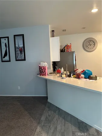 a room with toys and wall painting