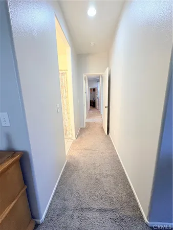 an entryway with a window in a room