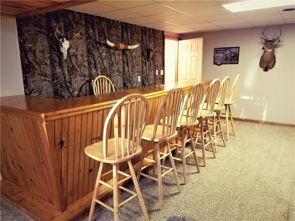 224 Stark Road Sarver, PA 16055 - Photo 18 of 25 Basement offers a finished room with partial bath, bar, and living space.