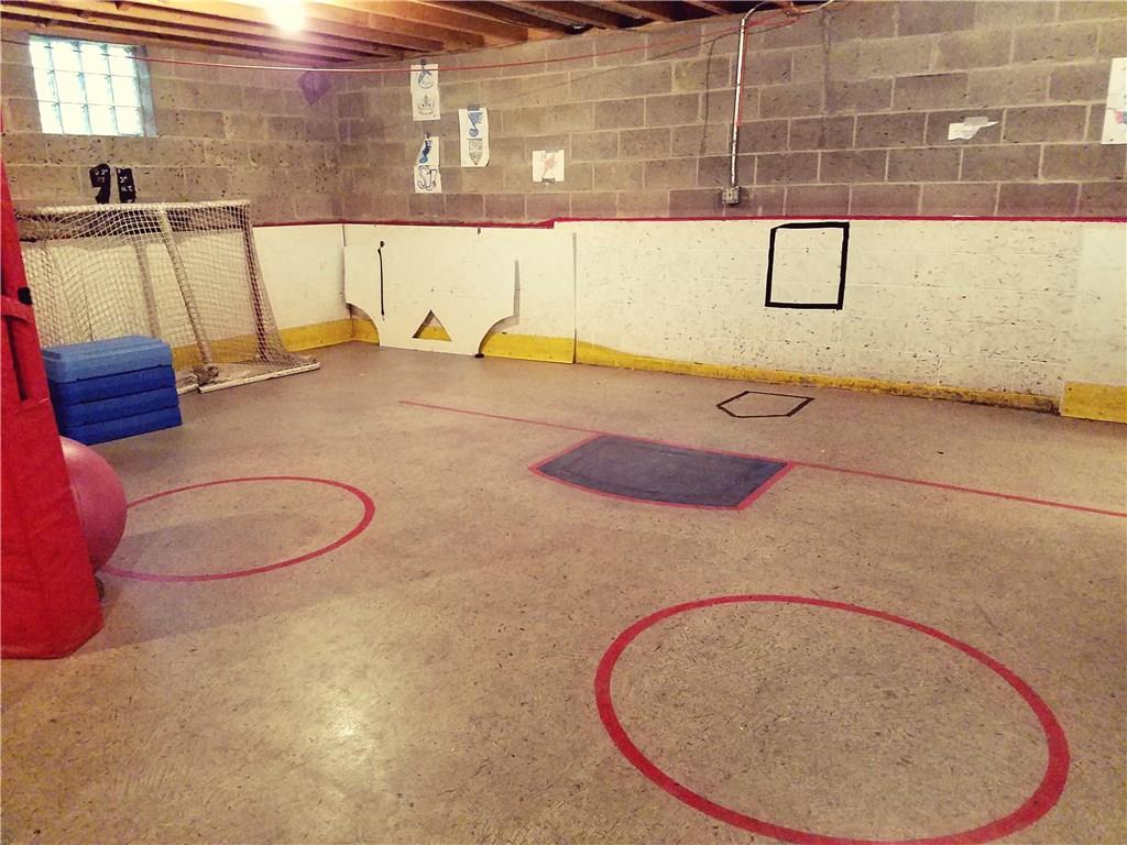 224 Stark Road Sarver, PA 16055 - Photo 23 of 25 Basement also has unfinished space where the space is used as a gym and sports center for kids.