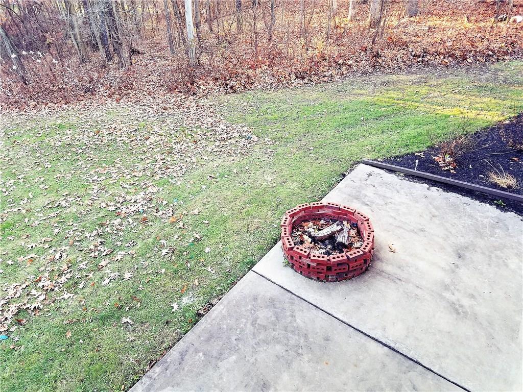 224 Stark Road Sarver, PA 16055 - Photo 24 of 25 Backyard also has a cement patio with a fire pit, the basement walks out right to this area.