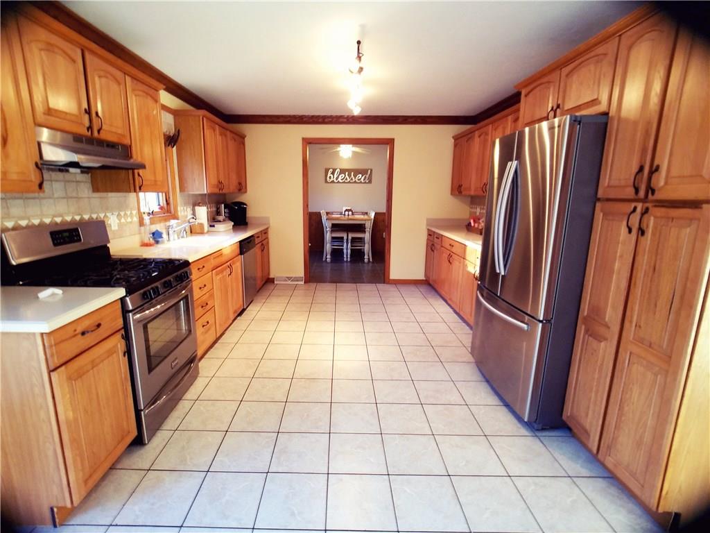 224 Stark Road Sarver, PA 16055 - Photo 6 of 25 Updated kitchen with tile flooring and stainless appliances. Right off the kitchen is a second dining area which is also used as office space.
