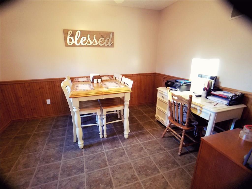 224 Stark Road Sarver, PA 16055 - Photo 7 of 25 Right off the kitchen, this room can be used for an office or dining room.