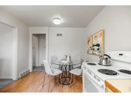 a bedroom with a bed and a cabinets