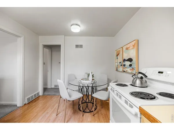 a bedroom with a bed and a cabinets