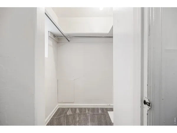 a bathroom with a shower sink and mirror