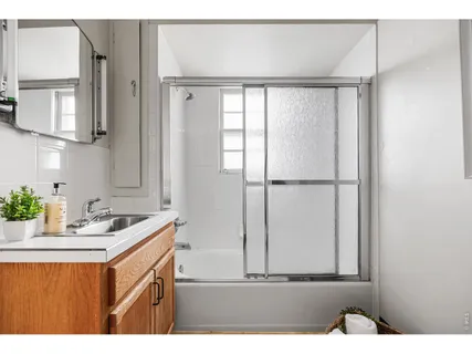 a view of an empty room with stairs