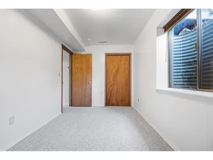 a bathroom with a sink toilet and a mirror