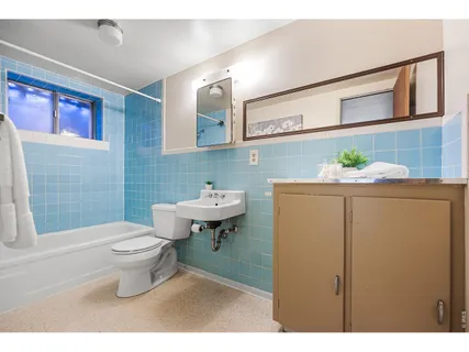 a view of a chairs and table in the patio