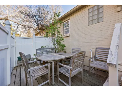 a view of road with large trees