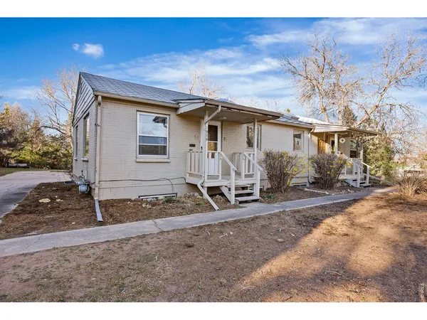 a view of backyard with green space