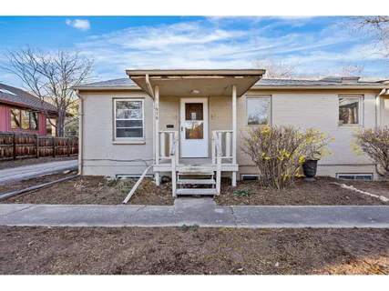 a view of street with parked cars