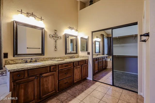 a bathroom with a sink and a shower