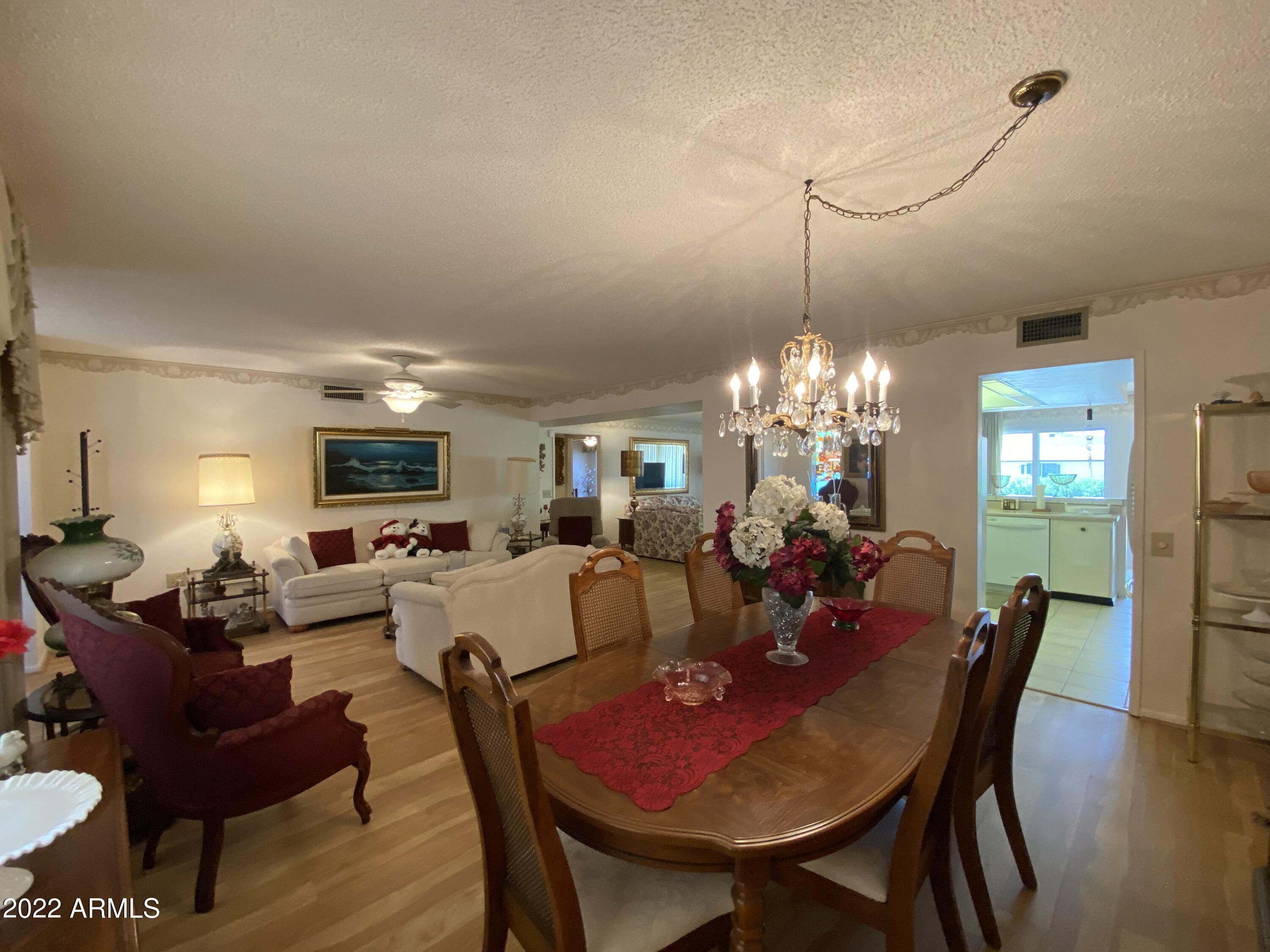 9807 West Mockingbird Drive Sun City, AZ 85373 - Photo 11 of 32 Dining and Living Rooms