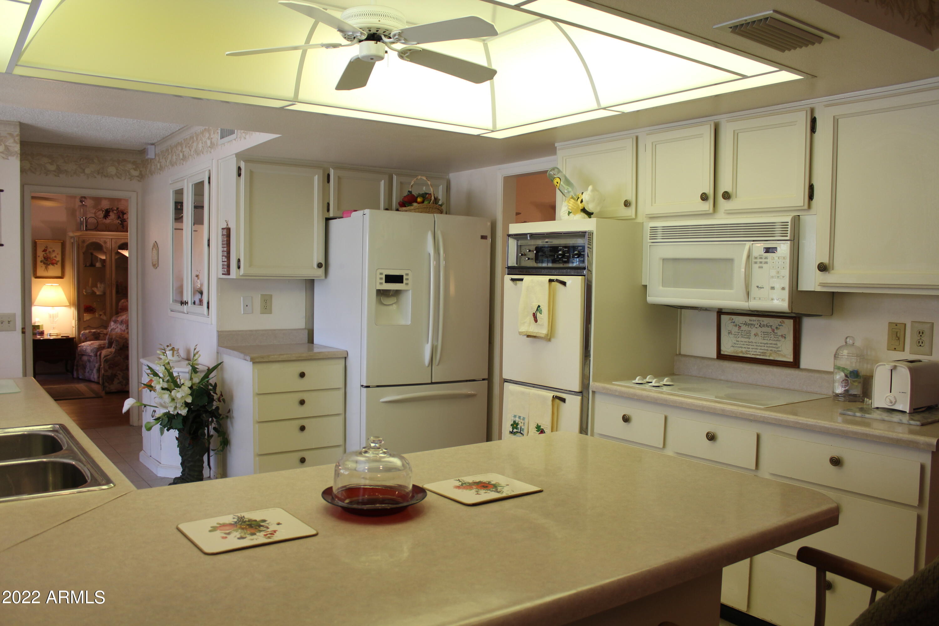 9807 West Mockingbird Drive Sun City, AZ 85373 - Photo 16 of 32 Bright Kitchen