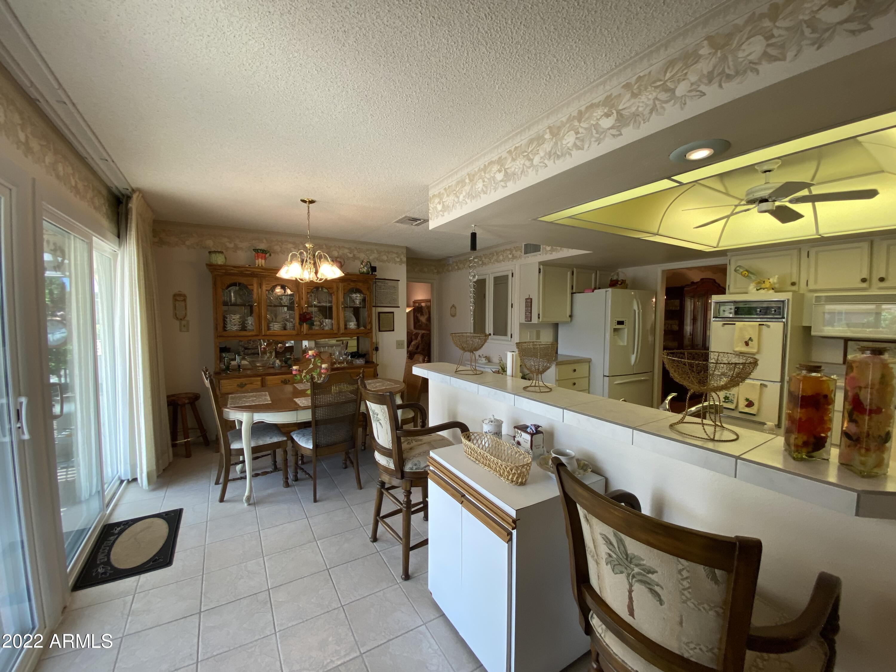 9807 West Mockingbird Drive Sun City, AZ 85373 - Photo 18 of 32 Breakfast Bar