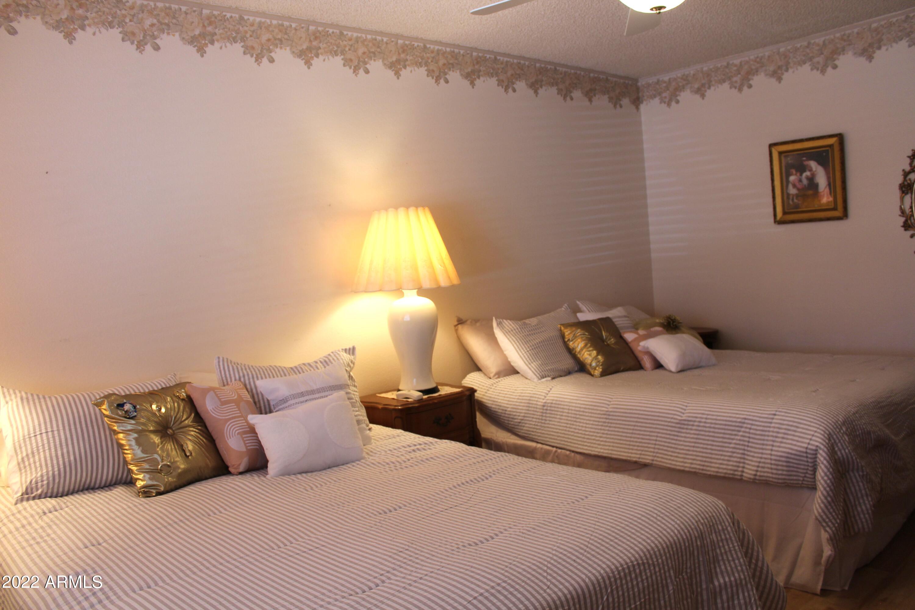 9807 West Mockingbird Drive Sun City, AZ 85373 - Photo 23 of 32 Second Bedroom