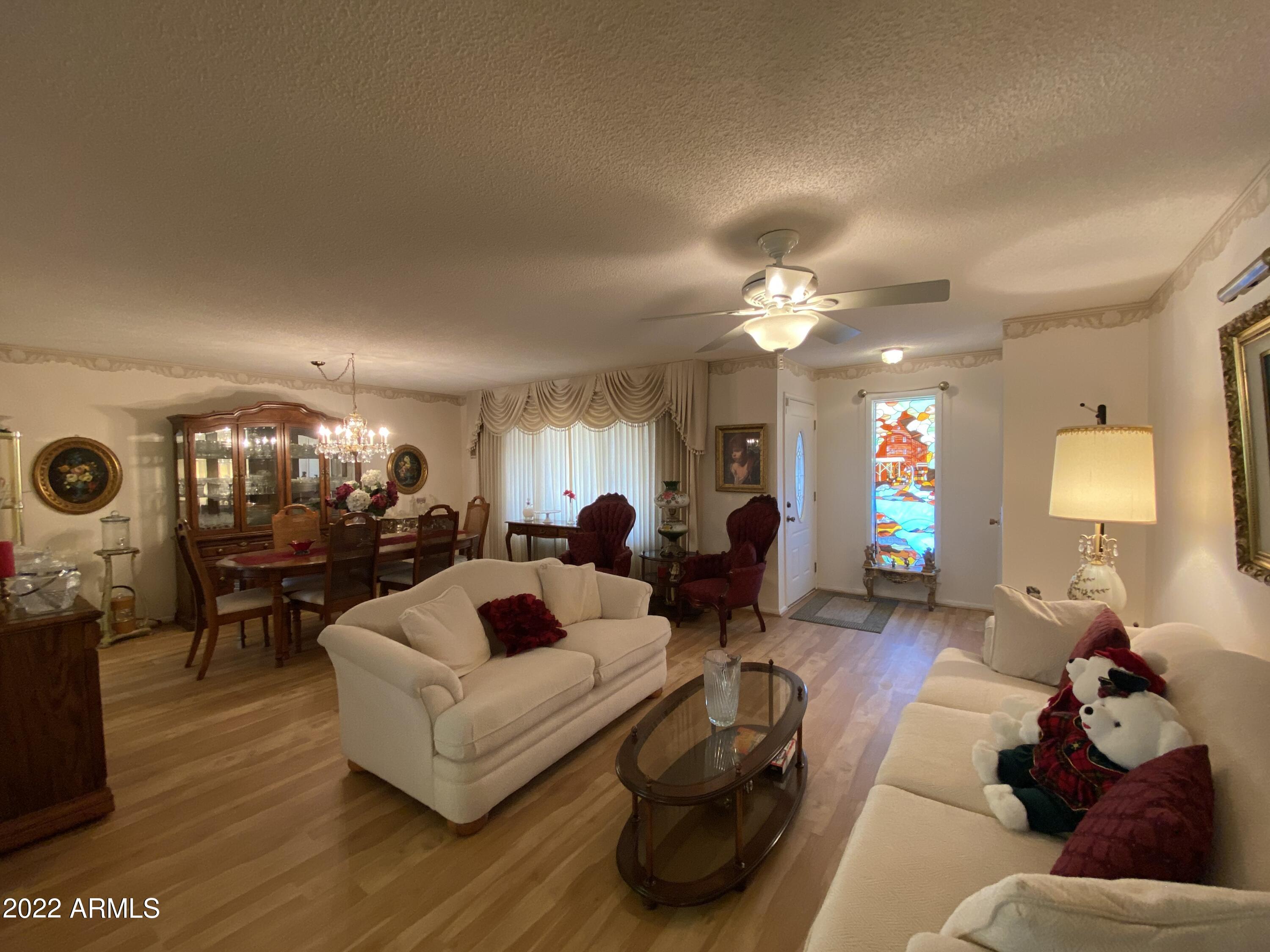 9807 West Mockingbird Drive Sun City, AZ 85373 - Photo 9 of 32 Living & Dining Room
