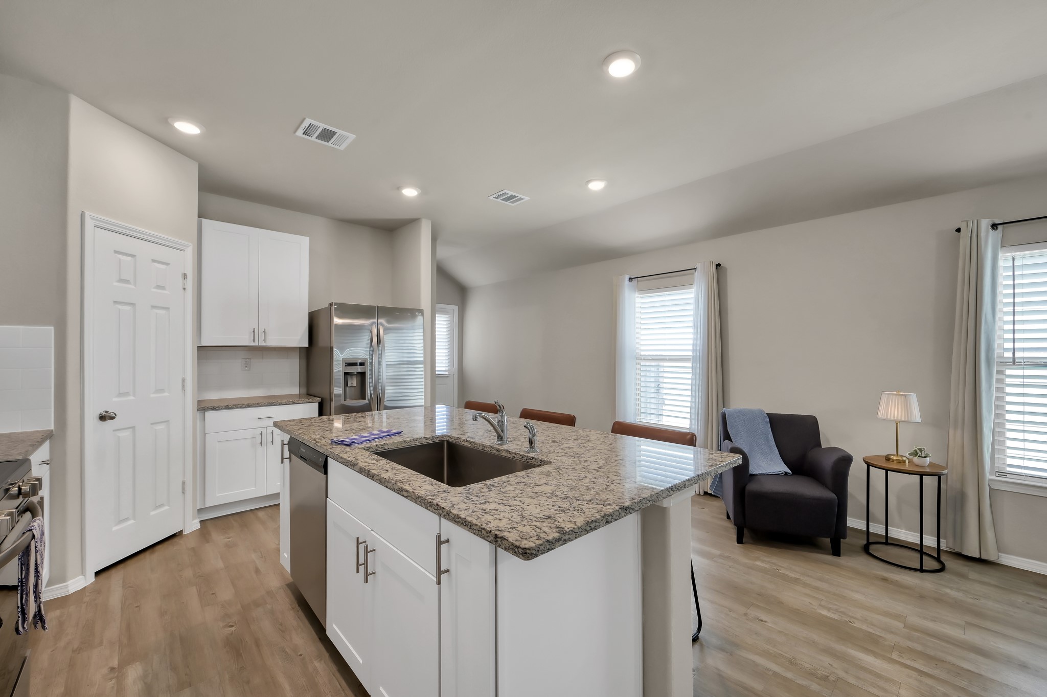 514 Dalloway Street Conroe, TX 77316 - Photo 11 of 27 Kitchen and dining area with open layout and clean finishes