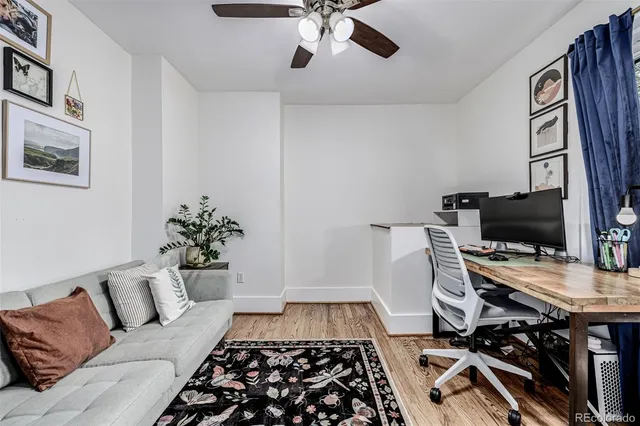 a bedroom with furniture and a window
