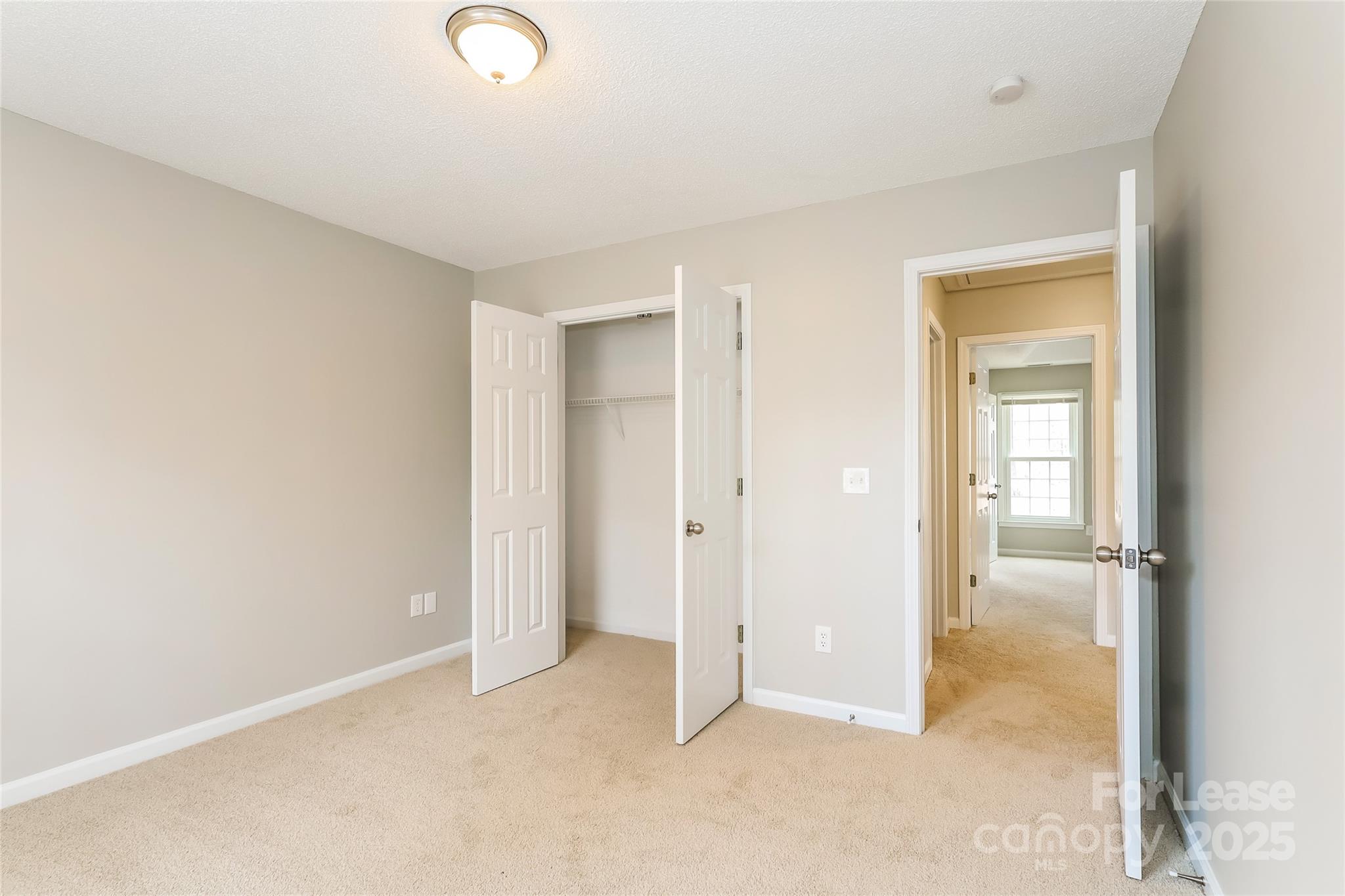 1323 Tucker Road Monroe, NC 28110 - Photo 12 of 16 an empty room with an entryway
