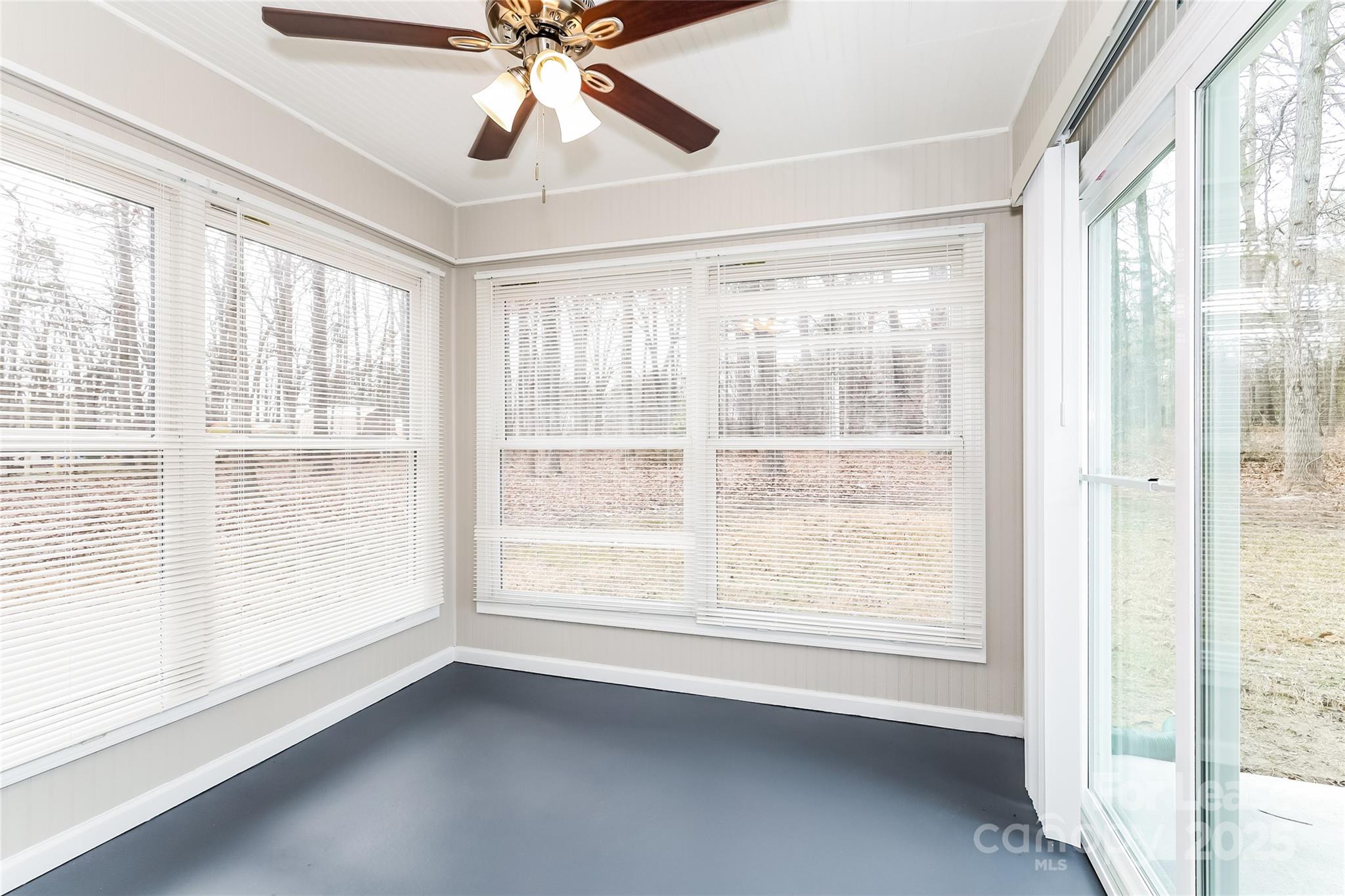 1323 Tucker Road Monroe, NC 28110 - Photo 7 of 16 a view of an empty room with a window