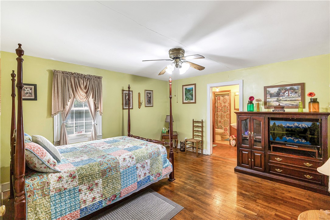 219 Beaty Square Anderson, SC 29624 - Photo 19 of 32 This spacious room features hardwood floors and a private bathroom entrance.