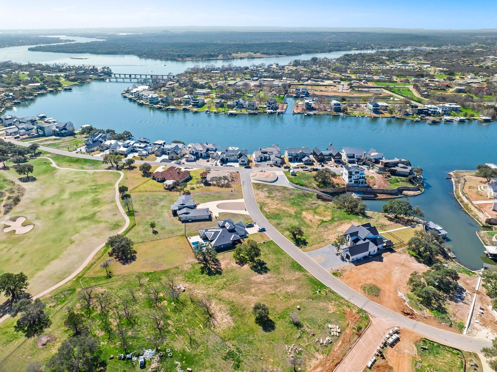 an aerial view of lake and city