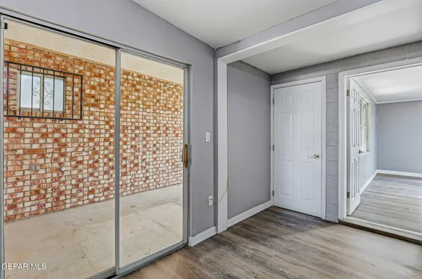 a view of entryway with wooden floor