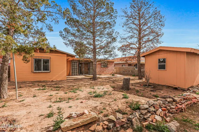 a view of a yard covered in snow