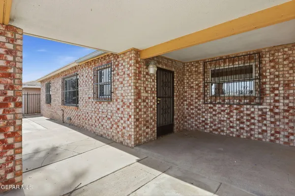 a front view of a house with a garage