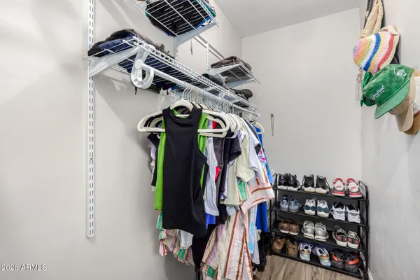 a close view of a utility room with dryer and washer