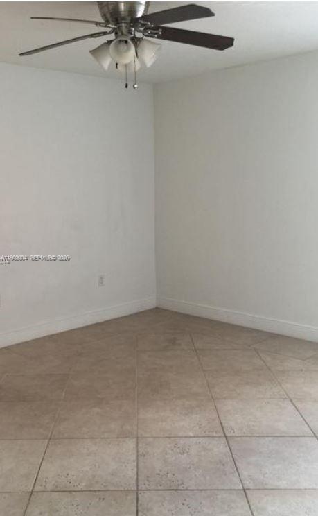 4705 Northwest 7th Street, Unit 2057 Miami, FL 33126 - Photo 9 of 9 a view of an empty room