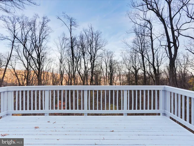 a view of a wooden roof deck