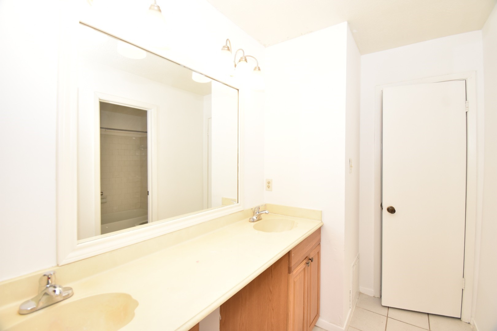 15926 Pfeiffer Drive Houston, TX 77082 - Photo 10 of 12 a bathroom with a sink and a mirror